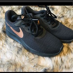Nike Tennis Shoes with Rose Gold . Worn only once
